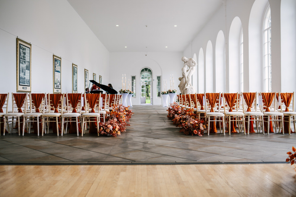 Margam Orangery Wedding Photographer - Elen Boutique burnt orange, autumn wedding decor