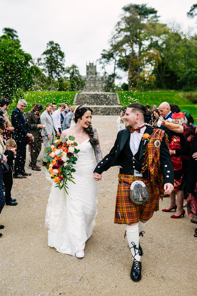 Confetti photos in front of Margam Castle - Wedding photography 