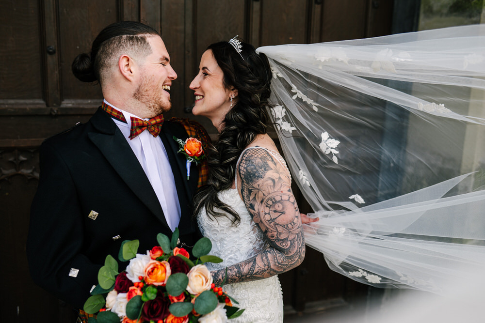 Bride and Groom portraits outside Margam Castle - romantic wedding portraits