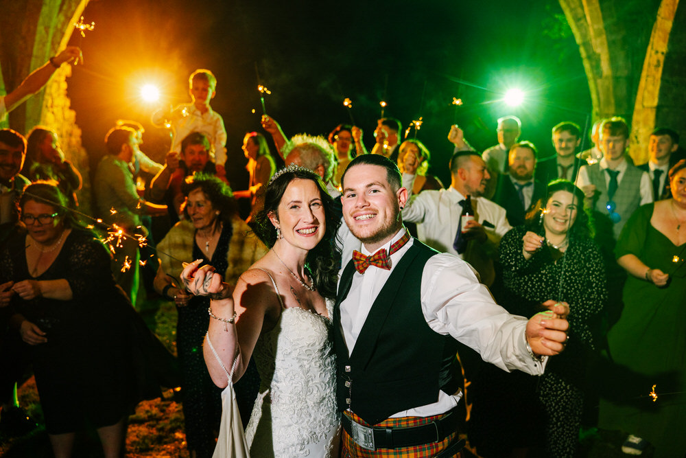 Margam Orangery Wedding photographer - light up evening wedding photos with sparklers